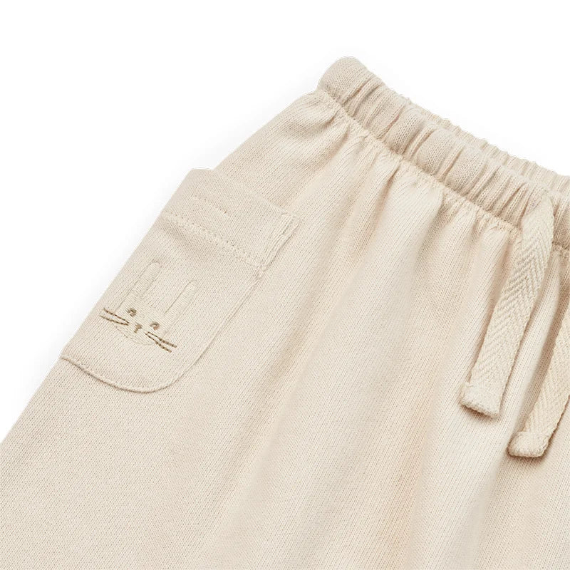 Beige Babyhose Alain mit Katzenkopf-Taschen und Kordelzugbund