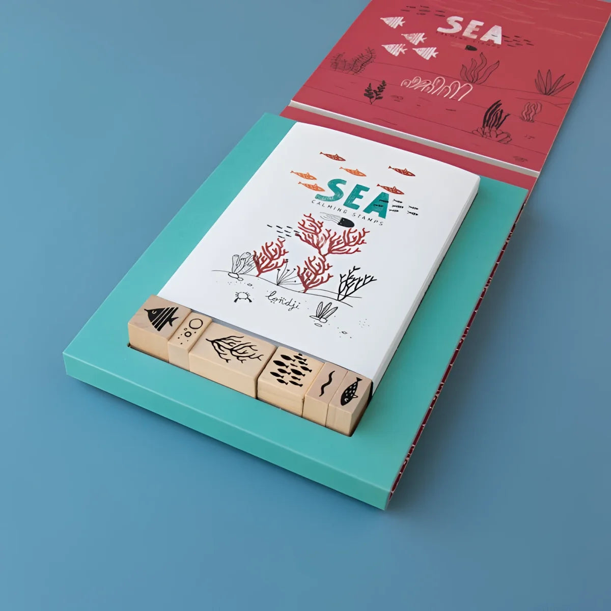 Beruhigende Stempel - Meer: Holzstempel Meer-Motiv-Set in Türkis-Rot-Box