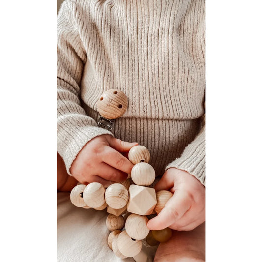 Holzspielzeug mit kugelförmigen Perlen, verbunden durch Elastik oder Schnur, Cross Ball