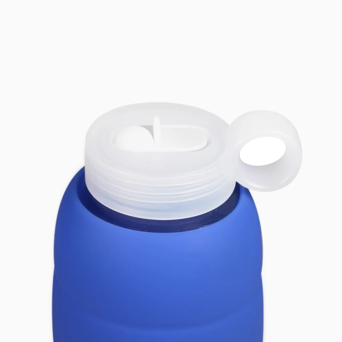Blaue Wasserflasche mit weißem Deckel, Teil des Flip Cap Mini Bottle und Day Bottle Systems