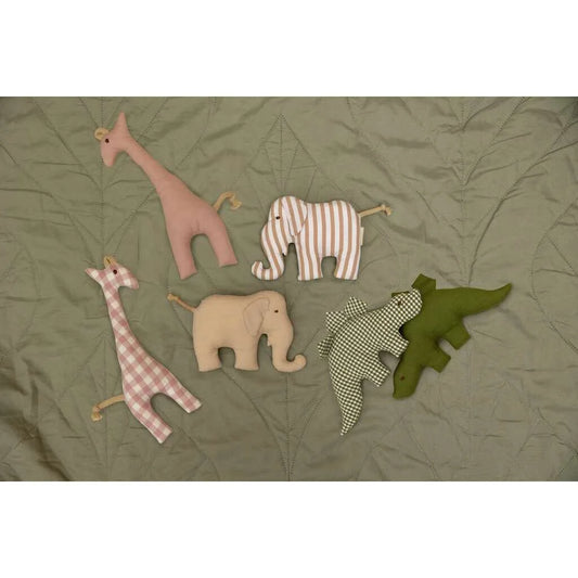 Stuffed animal toys displayed as Greiftier Dino in a colorful arrangement