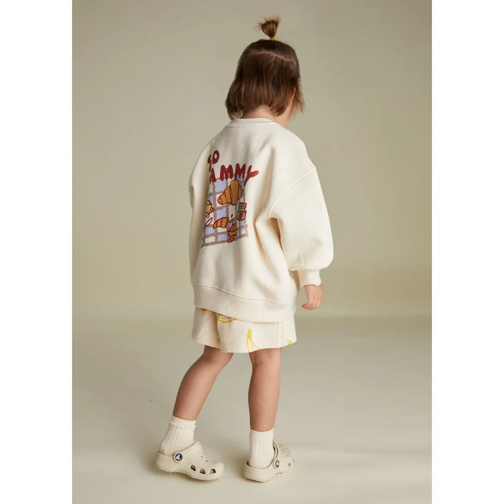 Kindercremefarbener Sweatshirt und Shorts Outfit für das Jammy Picnic Sweater Produkt