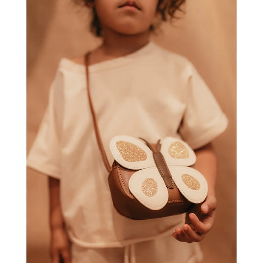 Schmetterlingsförmige Tasche mit eiförmigen Mustern auf den Flügeln