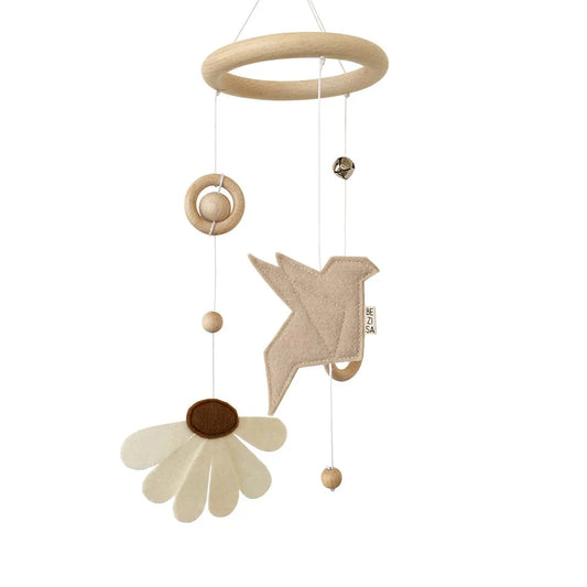 Baby mobile in Beige featuring bird, flower, and circular shapes for nursery decor