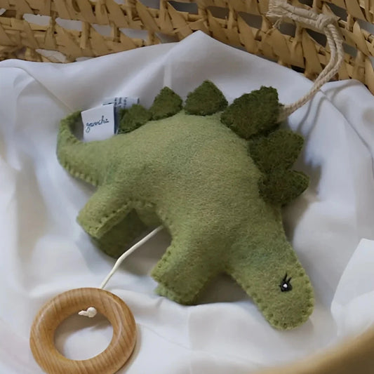 Gamcha Musikspieluhr Stegosaurus Dinosaurier aus grünem Filz in einem Korb