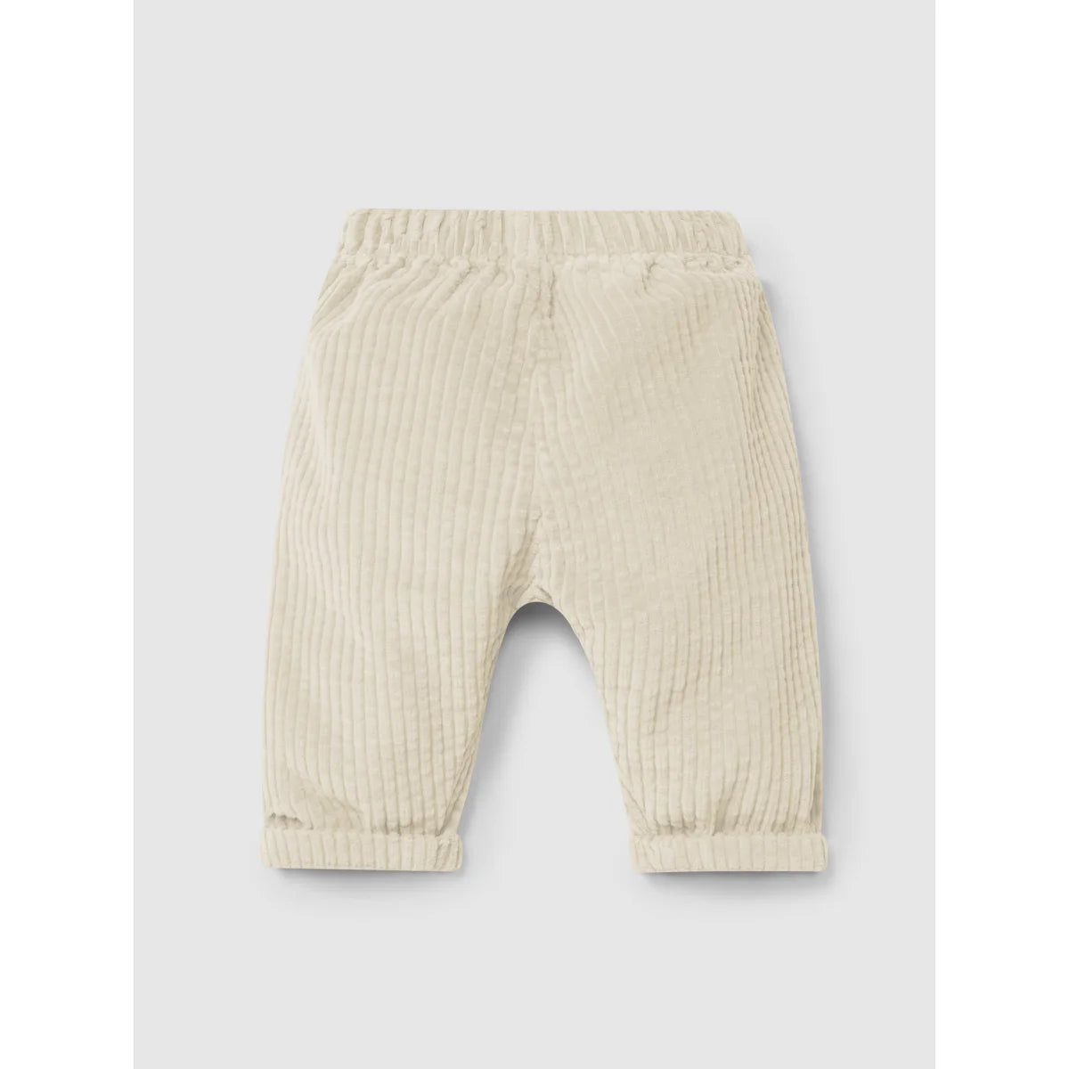 Helles cremefarbenes Corduroy-Babypantalon mit elastischem Bund und geknöpfte Bündchen