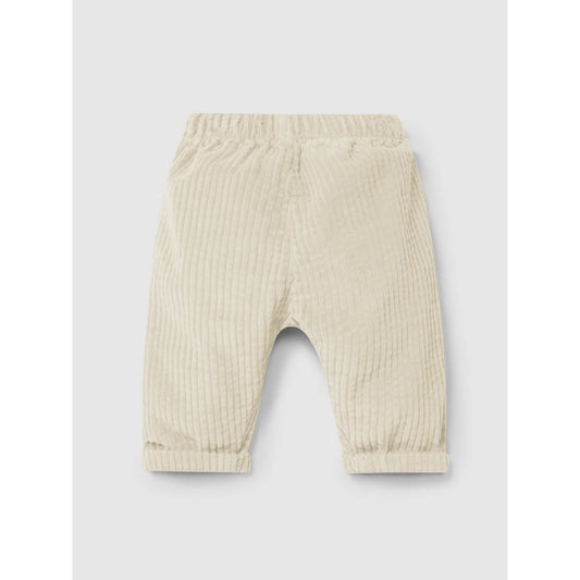 Helles cremefarbenes Corduroy-Babypantalon mit elastischem Bund und geknöpfte Bündchen