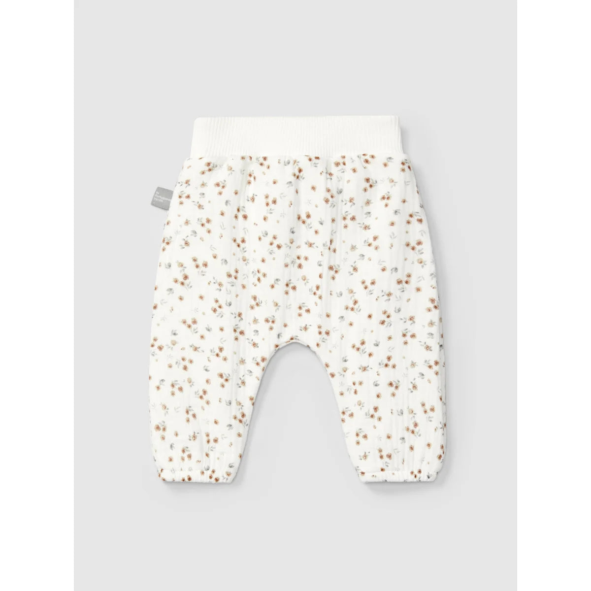 Creamfarbene Babyhosen mit all-over zartem Blumenmuster und elastischen Bündchen