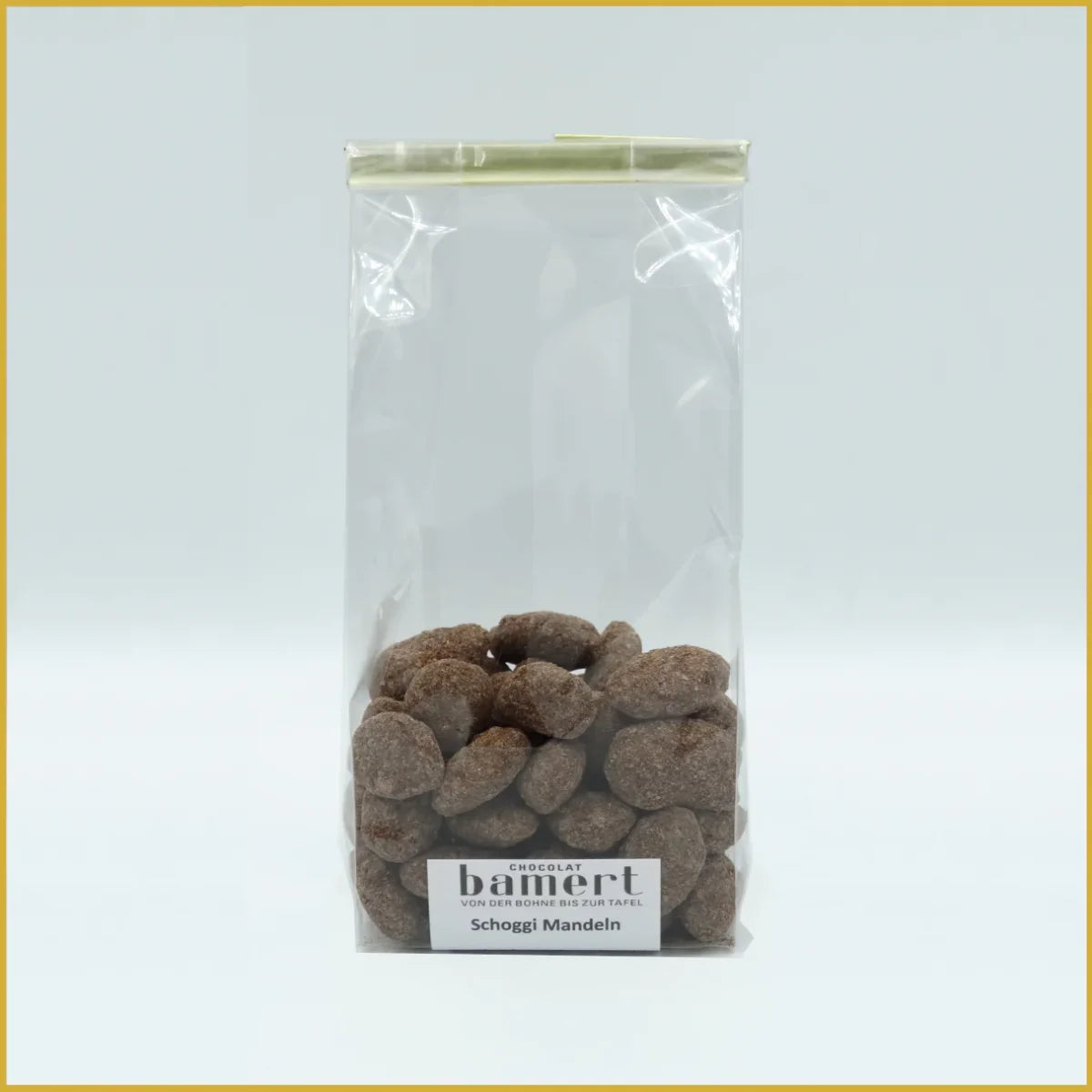 Schoggi Mandeln 100g mit klarer Plastiktüte voller schokolierten Mandeln
