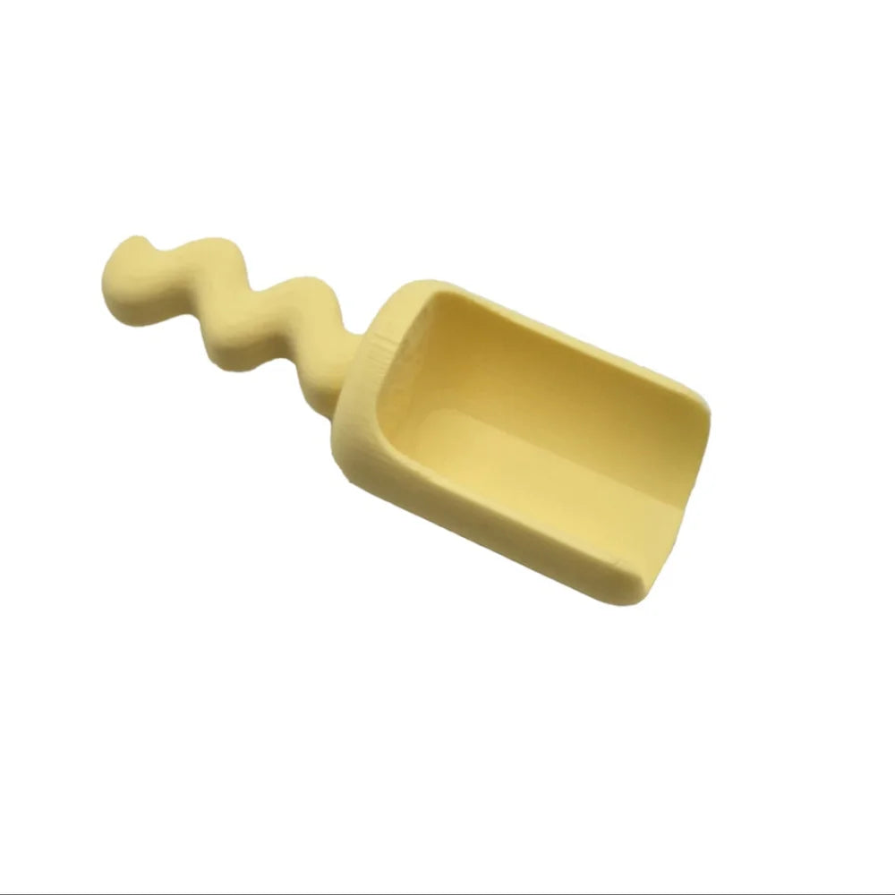 Pale gelbe Wellen-Schaufel für Kinder, nachhaltige Kinderprodukte Schweiz, grennn xl-spielschäufelchen