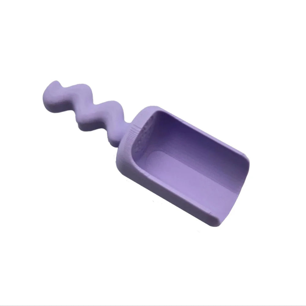 Pastellviolettes Spielschäufelchen Wave mit welligem Griff, ideal für kreative Bastelarbeiten
