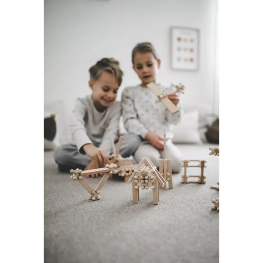 Helle Holzbauklötze mit Kugelauslösern aus START 80 Set