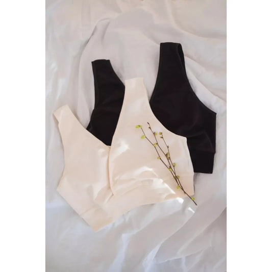 Cremeweißer nahtloser BH Still natur mit schwarzen Varianten, weicher Stoff