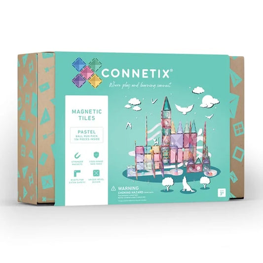 Connetix Magnetbausteine Pastellfarben mit Schlossdesign auf türkisfarbenem Karton.