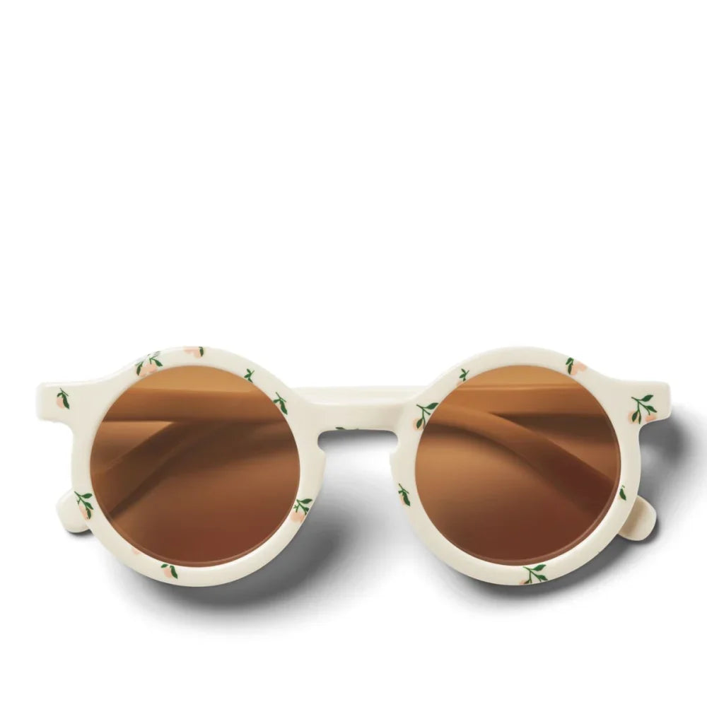 Runde Sonnenbrille mit weißen Blumenmuster für Kleinkinder im Artikel Perfekter Schutz und Stil