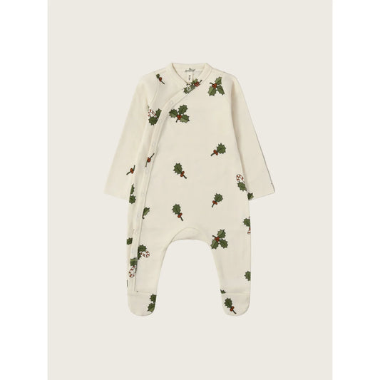 Weiches cremefarbenes Baby-Strampelanzug mit festlichem Stechpalmen- und Zuckerstangenmuster