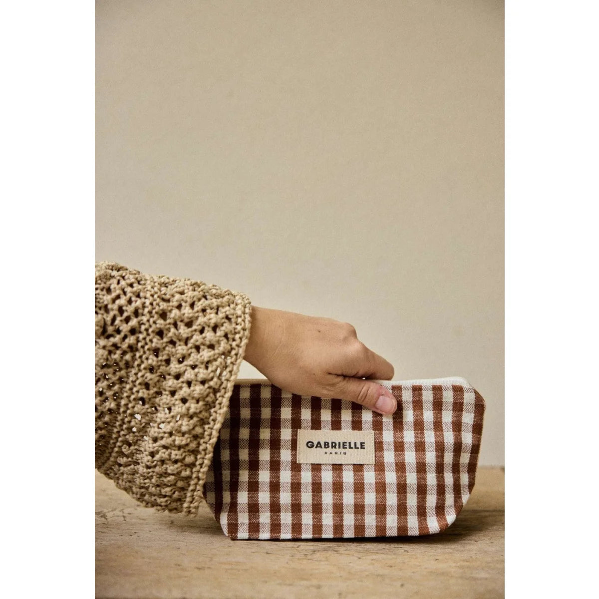 Brown and white gingham beauty pouch with gabrielle paris label ideal for ökologische baby- & kinderprodukte gift options