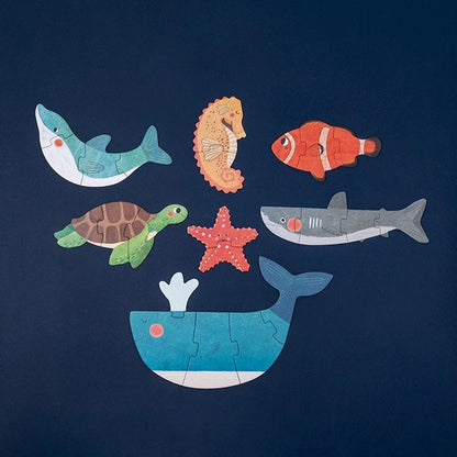 Buntes Ozean-Puzzle mit Blauem Wal, Grüner Schildkröte und mehr