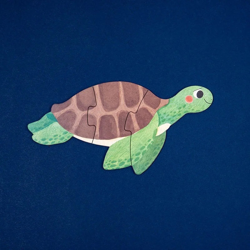 Charmantes Grünes Seeturtles-Rätsel mit braunem Panzer aus Papier