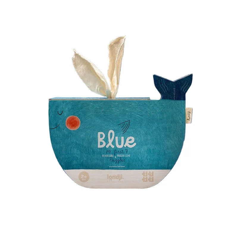 Blauer Wal-Puzzlekasten mit texturierter türkisfarbener Oberfläche, weißen Hasenohren und Londji-Marke