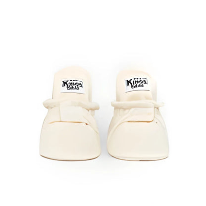 Paar cremefarbener Sneakers mit weißen Sohlen für Booties Cotton Original 0 - 12 Monate