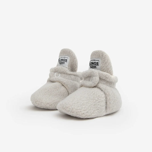 Graue flauschige Babybooties mit Schleife und Logo, Teddy 0-12 Monate
