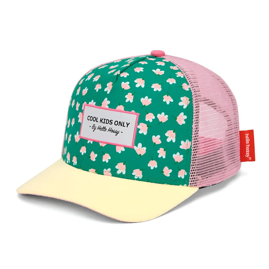 A vibrant green and pink floral-patterned trucker hat with pale yellow brim featuring cool kids only label by Hello Kitty