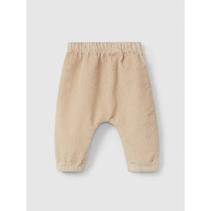 Beige Corduroy Baby Pants mit elastischem Bund und lockerer Passform in Farbe Sand