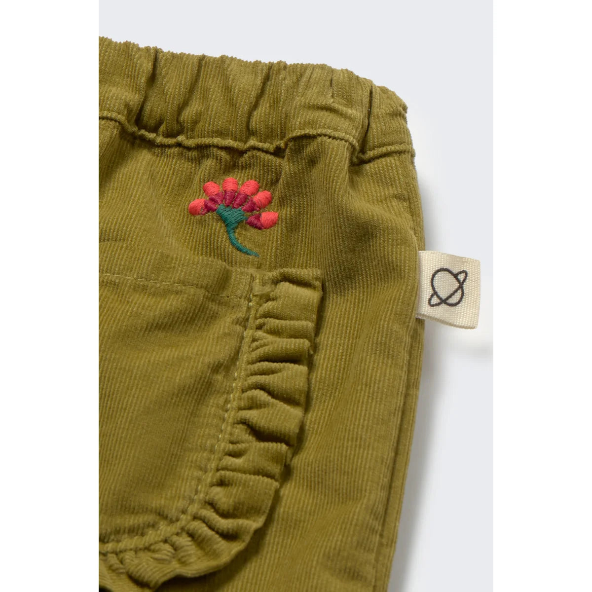 Cozmo Babyhose Agen Green, Detail der Blumenstickerei