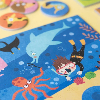 Buntes Unterwasser-Lotto für Kinder: Junge mit Taucherausrüstung, Oktopus und Delphin