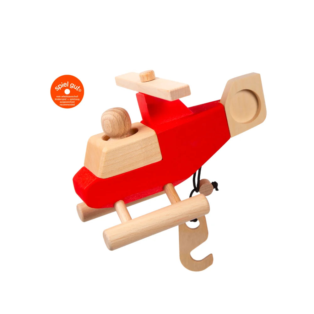 Rotes Holzhubschrauber-Spielzeug CARLSON mit rotierendem Propeller und Fahrwerk