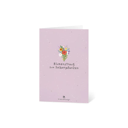Eine soft lavendelfarbene karte mit zartem aquarellblumenstrauß und text blumenstrauß zum selberpflanzen ideal für ökologische baby- & kinderprodukte