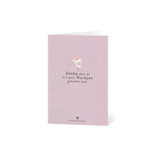 Eine zarte rosa karte danke dass du mir beim wachsen geholfen hast mit weißer gänseblümchenillustration ideal für ökologische baby- & kinderprodukte