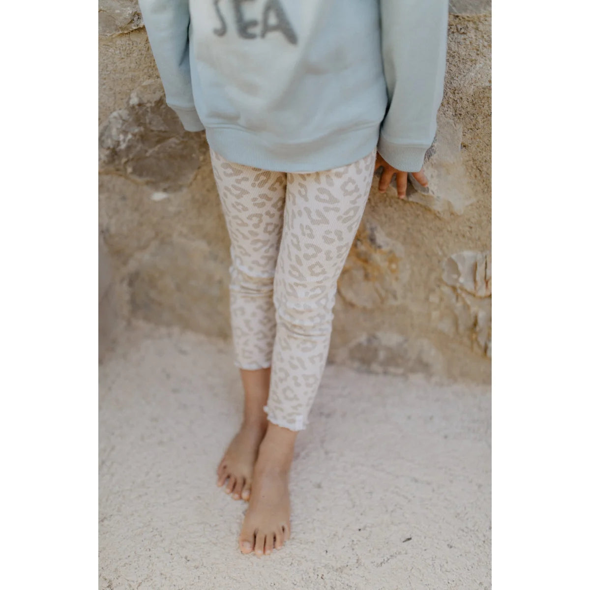 Leggings Leo mit Schleife in Creme mit beigem Leopardmuster