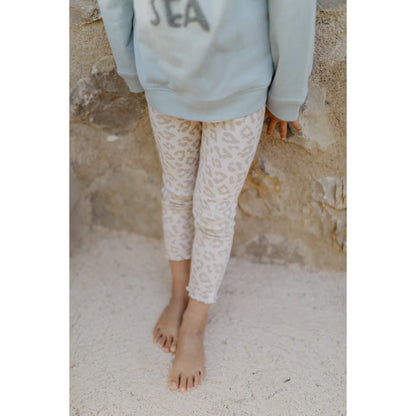 Leggings Leo mit Schleife in Creme mit beigem Leopardmuster