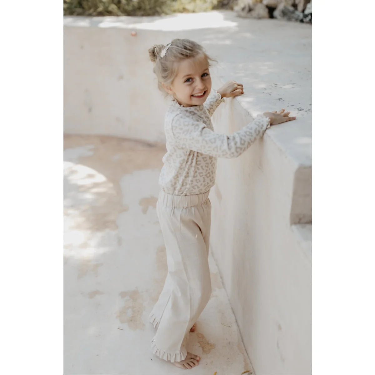 Nachhaltige Babykleidung: Longsleeve mit hohem Kragen Leo, Mädchen-Rückenansicht