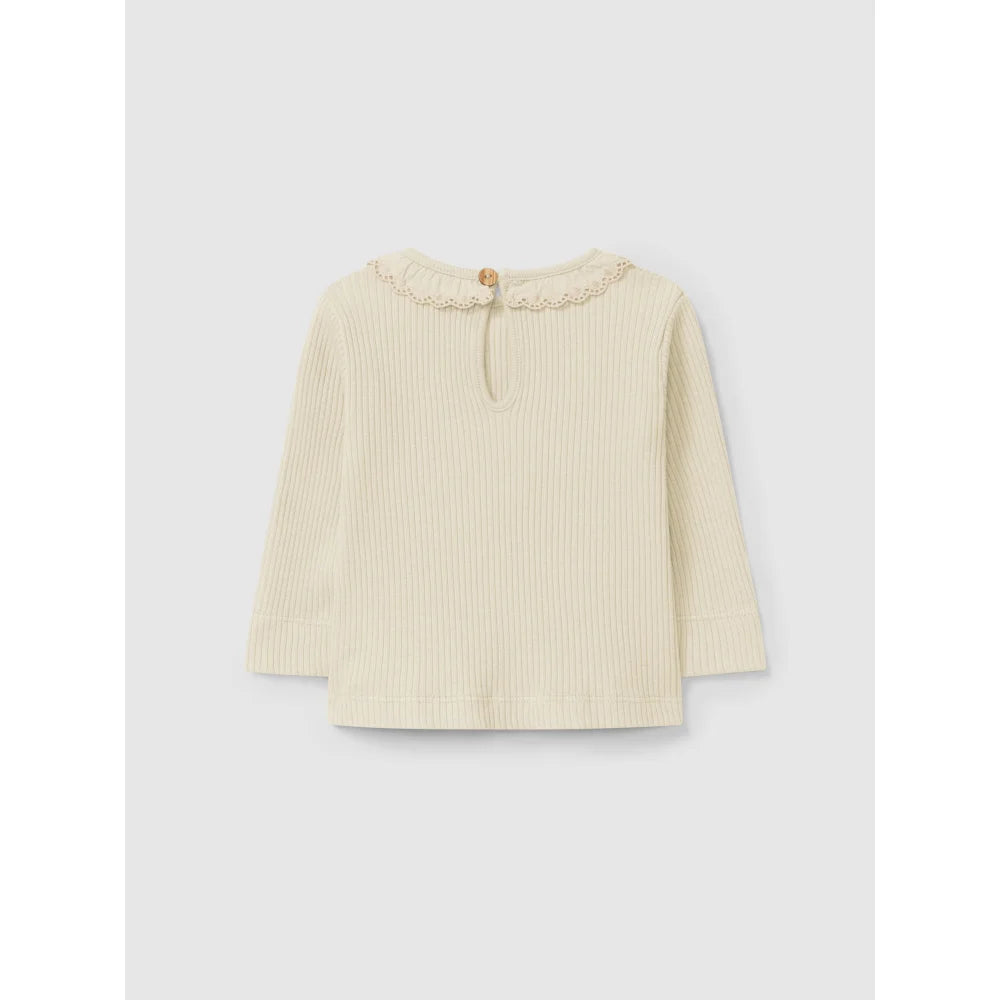 Cremefarbener, gerippter Langarmtop mit gerafftem Kragen und einknopfverschluss hinten