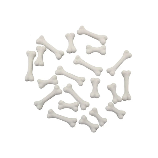 Haufen weiße knochenförmige Hundeleckerlis im Mini Dino-Knochen Set mit Mini Waves Pastell