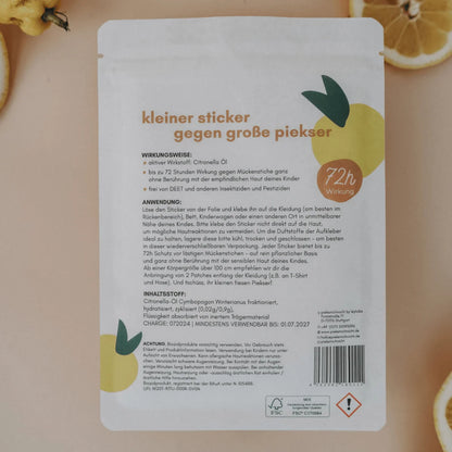 Weißes Päckchen Zitronen-Mückenschutz-Sticker Space Edition, Zitrus-Design, deutscher Text
