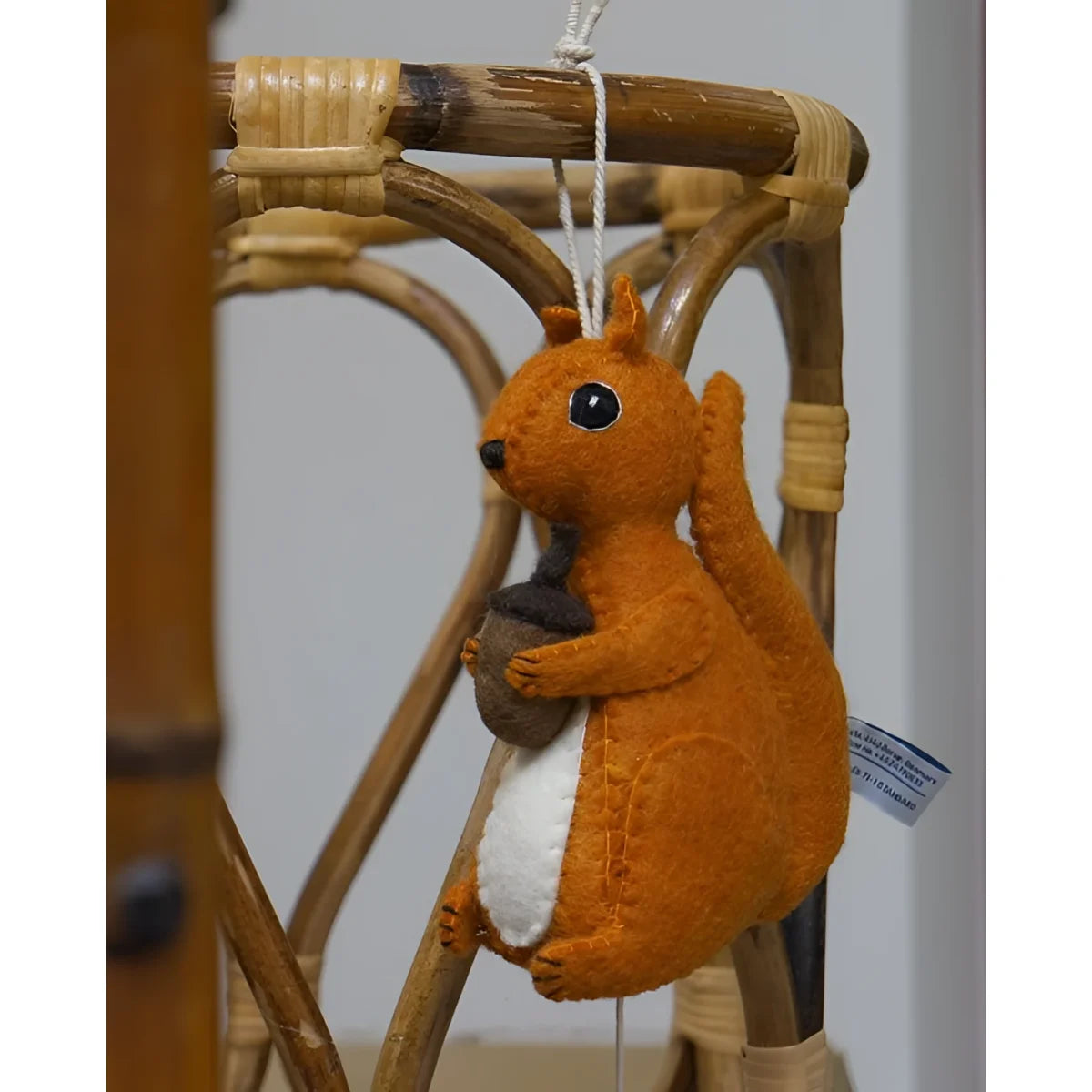 Gamcha Musikspieluhr Eichhörnchen in Orange aus Filz, hängend