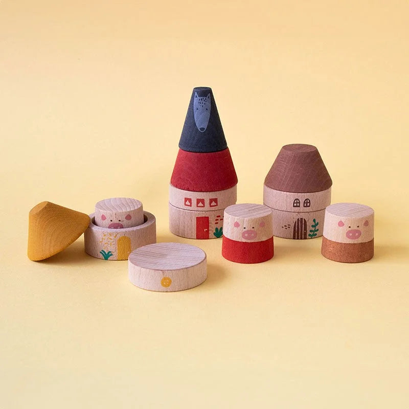Holzstapelspielhäuser mit Tiergesichtern und bunten Kegeldächern, Mein Drei Kleine Schweinchen