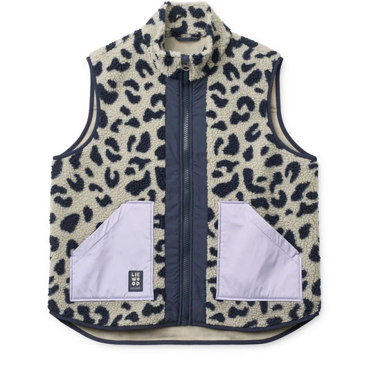 Nilu adult pile vest in cream fleece with black leopard print and navy blue zipper and trim for warmth and style