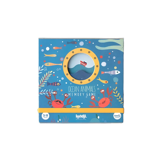 Blaues Kartonbox für Londji Ozean-Tiere-Gedächtnisspiel mit gelbem Bullauge und Unterwasser-Szene