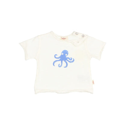 Nachhaltige Babykleidung Schweiz: Cremefarbene Babytee mit blauem Oktopus