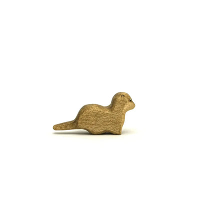 Carved wooden otter figurine displayed in Otter Klein product collection