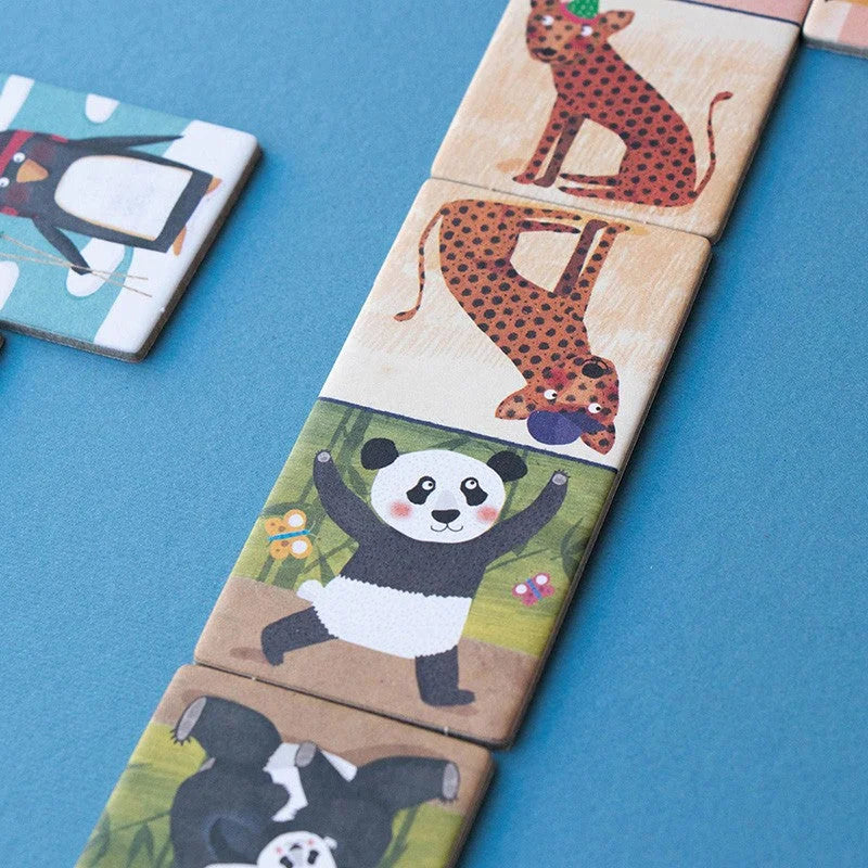 Bunte Puzzlestücke mit Tier-Motiven wie Panda und Leopard im Penguins Family Domino