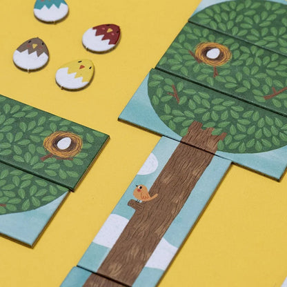 Holz-Puzzle-Teile PIU PIU Tiny Game mit Bäumen Nestern Küken