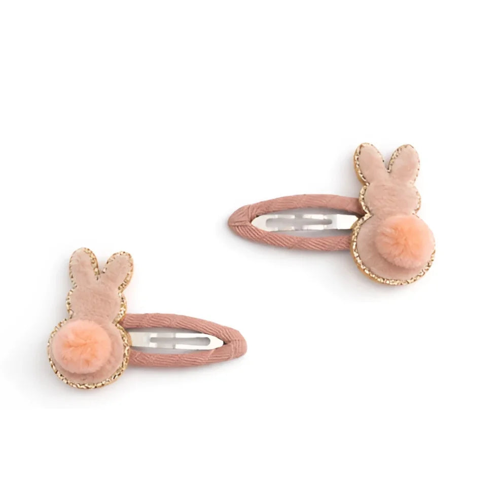 Pastellrosa Häschen-Haarspangen mit flauschigen Pompons von billy loves audrey