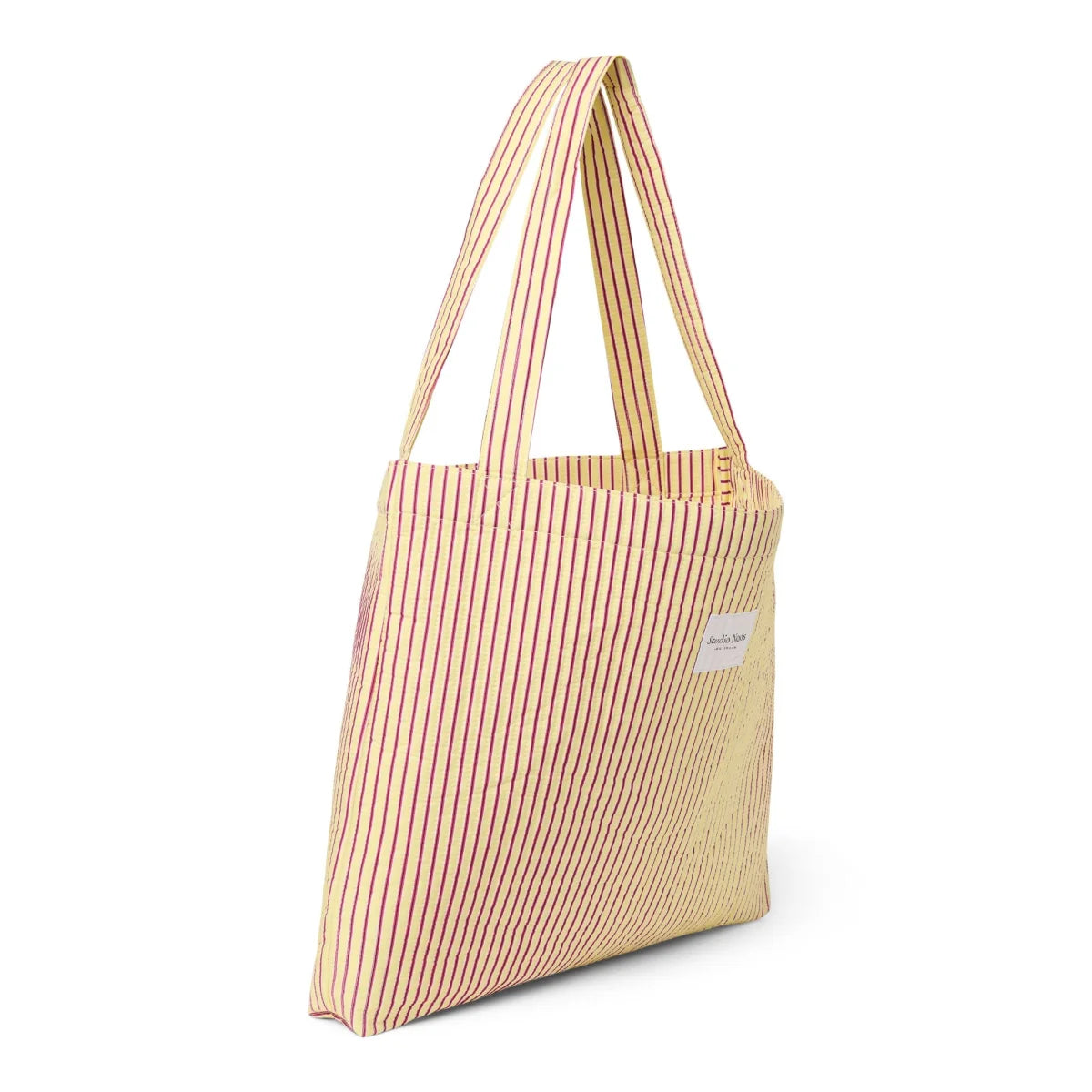 Beige canvas tote bag mit roten streifen und buttergelben akzenten aus poplinn baumwolle für ökologische baby- und kinderprodukte