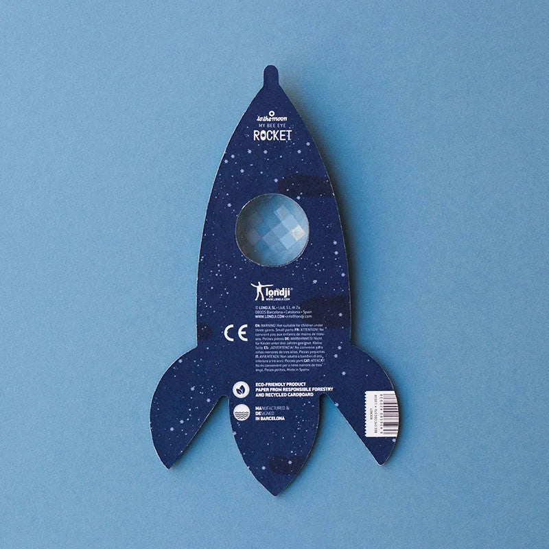 Blaue Pappe-Raketen-Wandlampe Rocket Bee Eye mit klarem, facettiertem Rundfenster